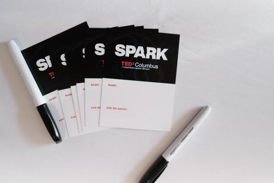 Black SPARK name cards and markers